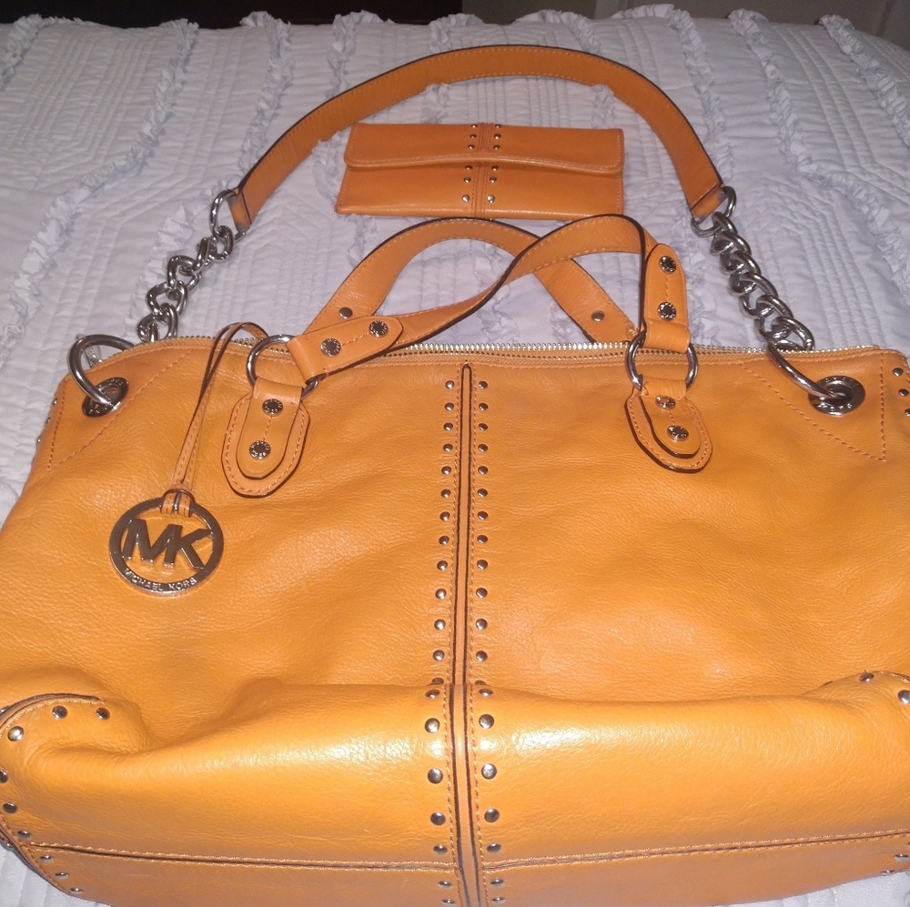 Tangerine and Silver Michael Kors purse and wallet